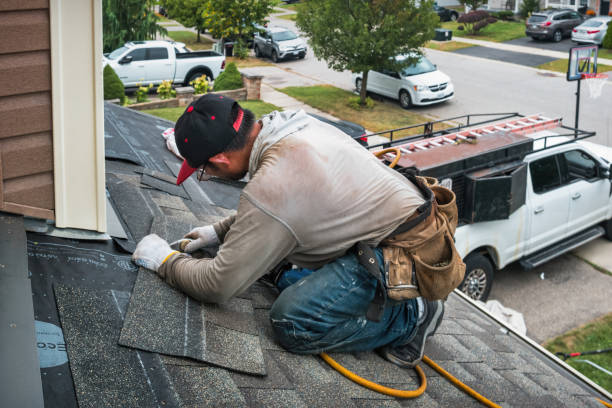 Professional Gutter Repair And Installation technician working in Wilton, ME